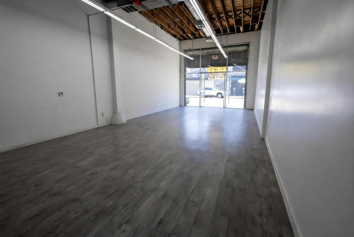 Ground-floor retail suite with storefront entrance