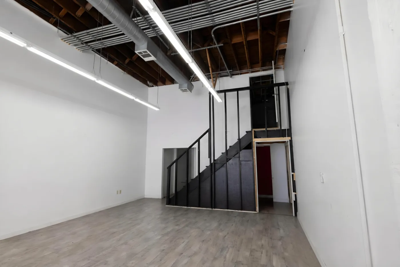 Suite with interior stair to a lower level