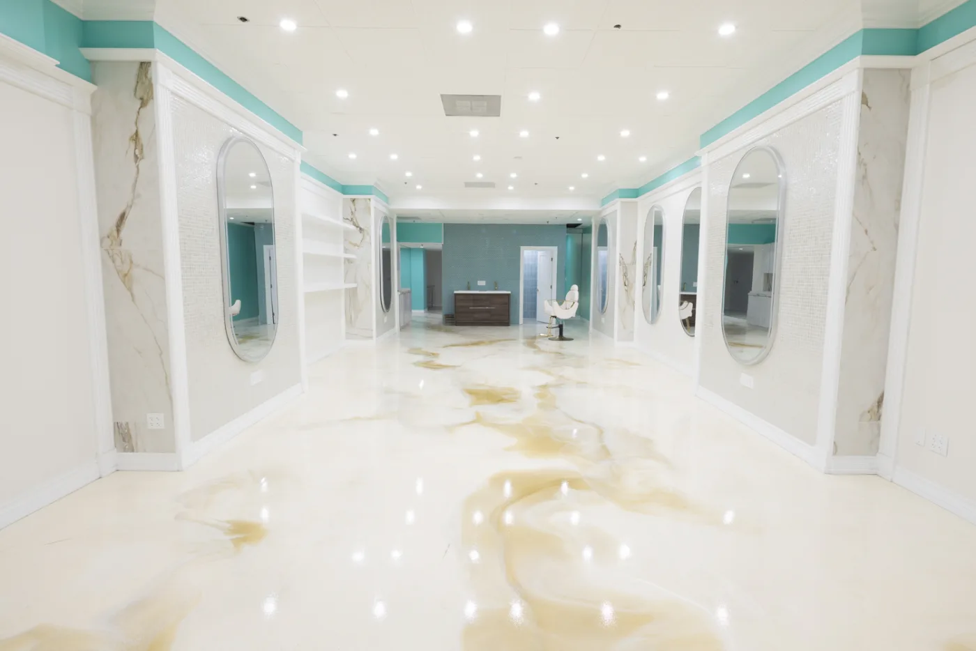 Salon suite — mirror wall and epoxy floor